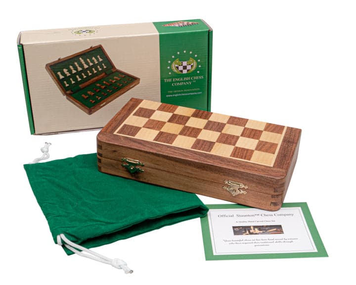 Magnetic folding wooden chess set with Staunton-style pieces and storage, 10 inch board, green pouch, and packaging box.