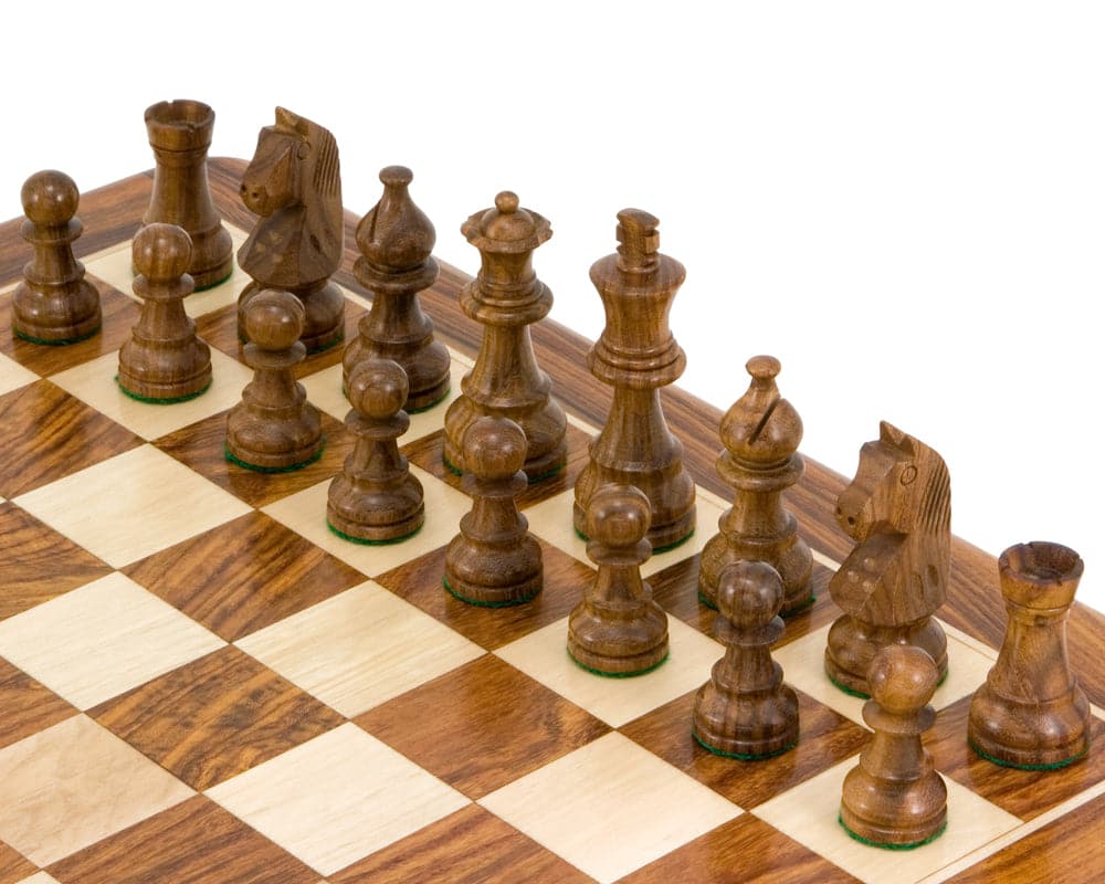 Down Head Knight Sheesham Staunton Chess Pieces set up on a chessboard, featuring 3-inch king handcrafted from sheesham and boxwood.