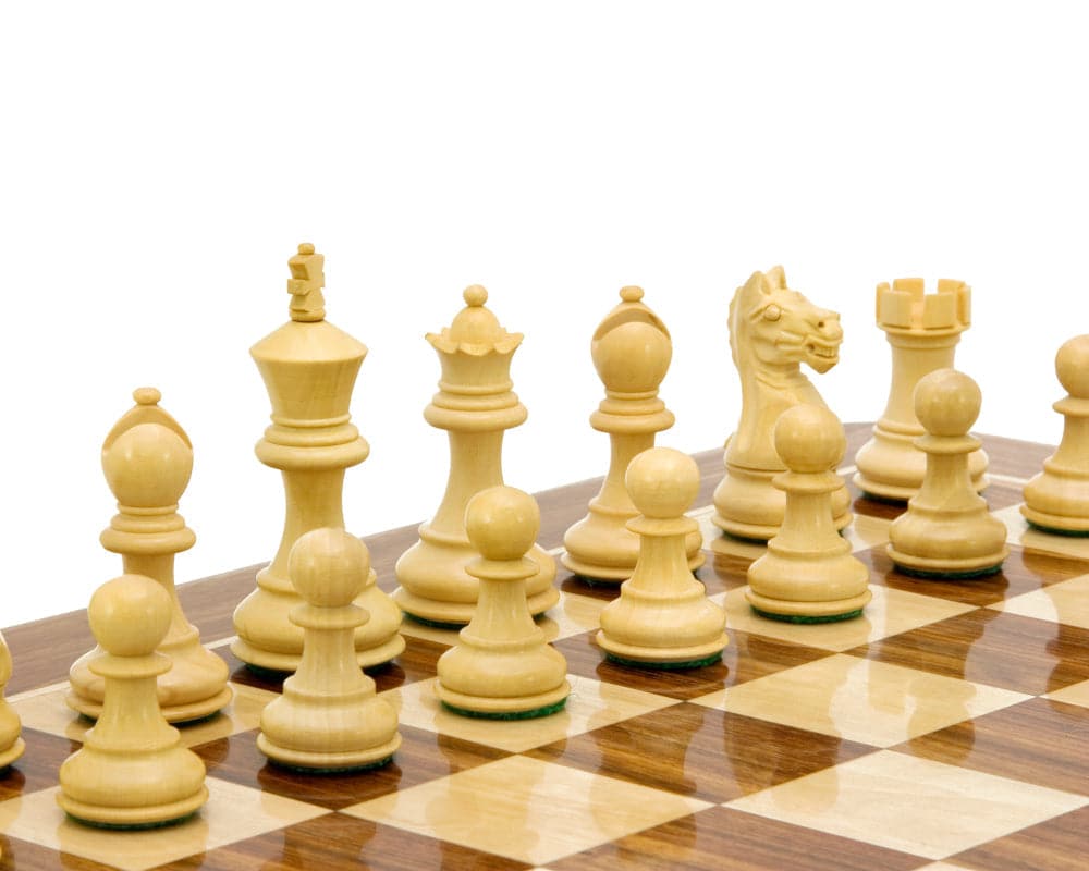 Classic Staunton chess pieces in sheesham and boxwood on a wooden chessboard.