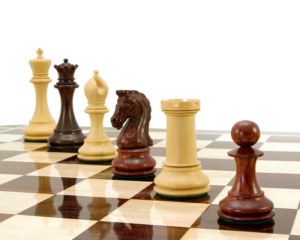 Eminence Series Rosewood Luxury Chess Pieces 4.5 inches displayed on chessboard