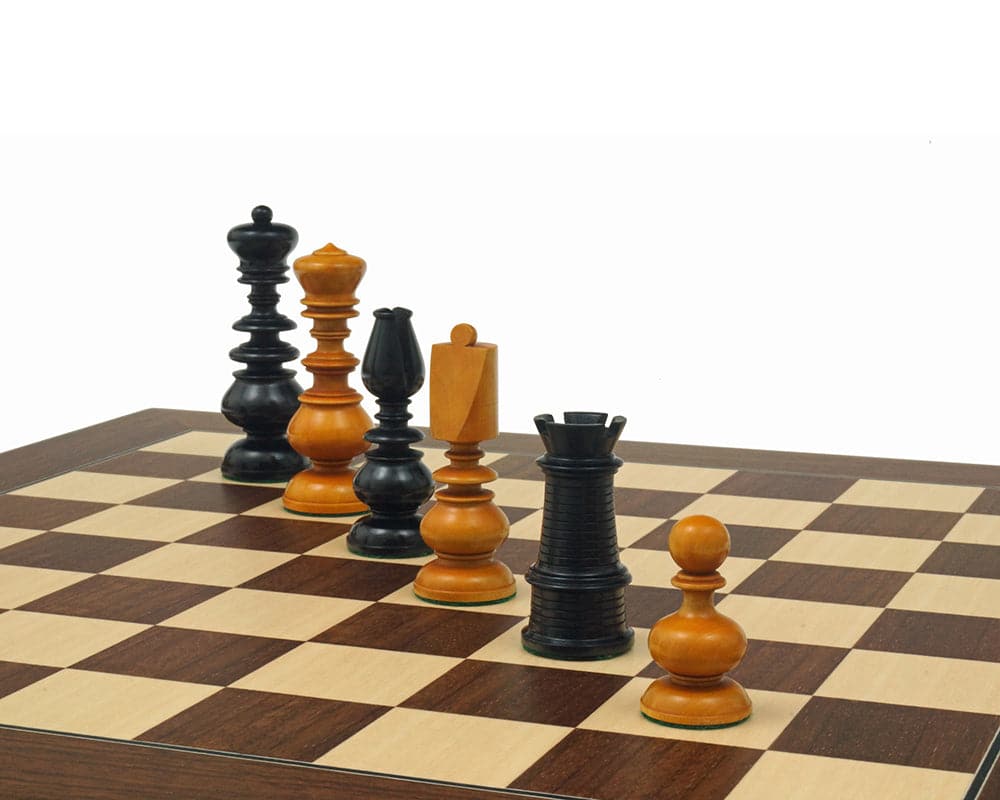 Calvert Series Antique Reproduction Chessmen displayed on chessboard featuring hand made and polished pieces with a 3.75" king