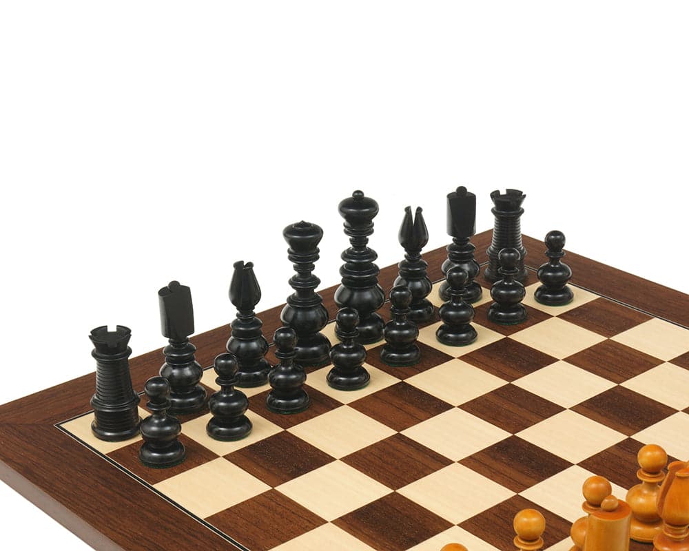 Calvert Series Antique Reproduction Chessmen on an 18-inch wooden chess board, featuring handcrafted and polished pieces with a 3.75-inch king