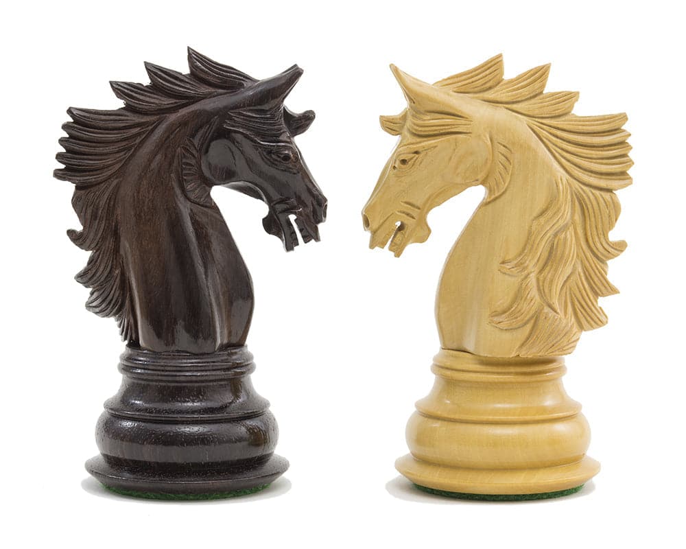 Rosewood and boxwood knight chess pieces from The Dubliner Rosewood Chess Men set, ornate and expertly crafted with intricate details.