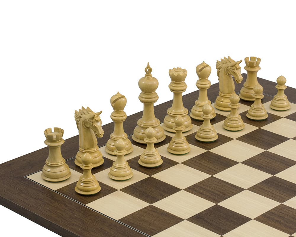 The Dubliner Rosewood Chess Men 4.7 inches set up on a wooden chessboard