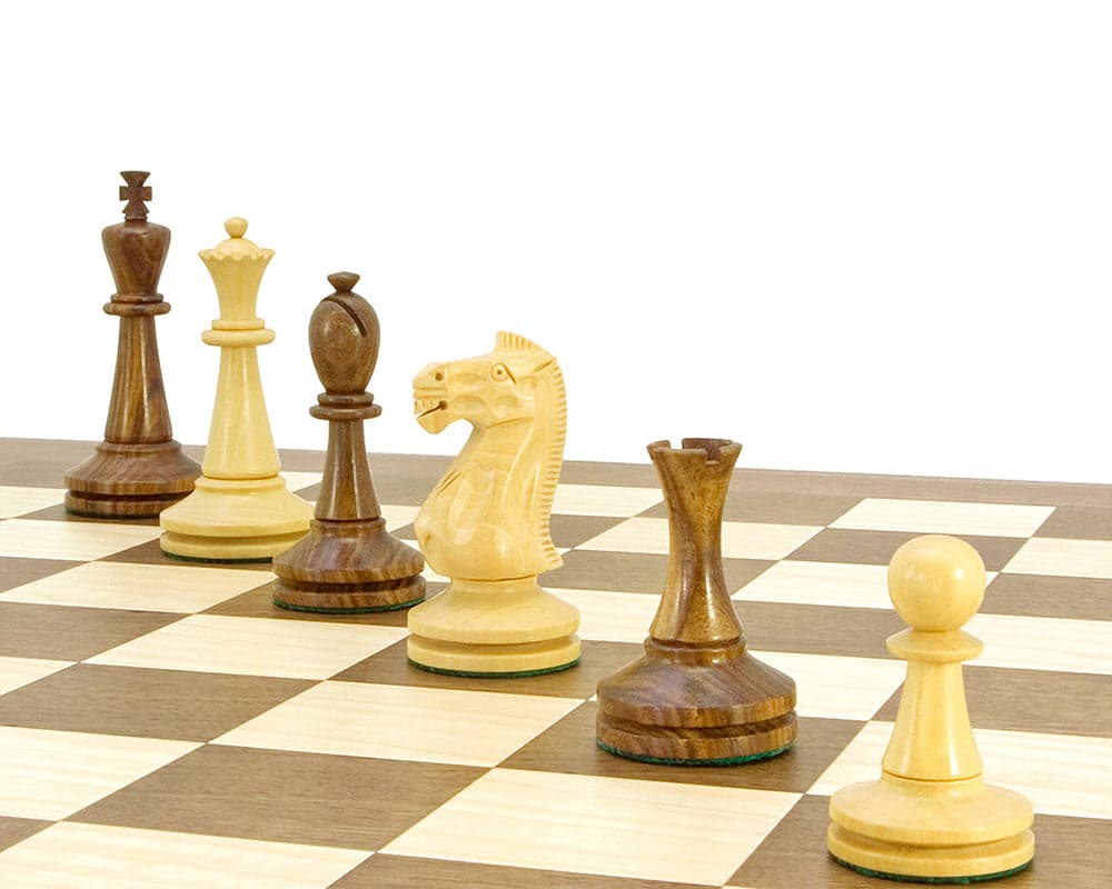 High-quality Blackmore Grandmaster Chess Set with sheesham wood pieces on a walnut and maple chessboard.