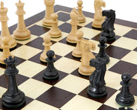 Victoria Ebonised Wenge Tournament Chess Set with 3.75 inch king on wenge and birch wood board, black and white pieces in play