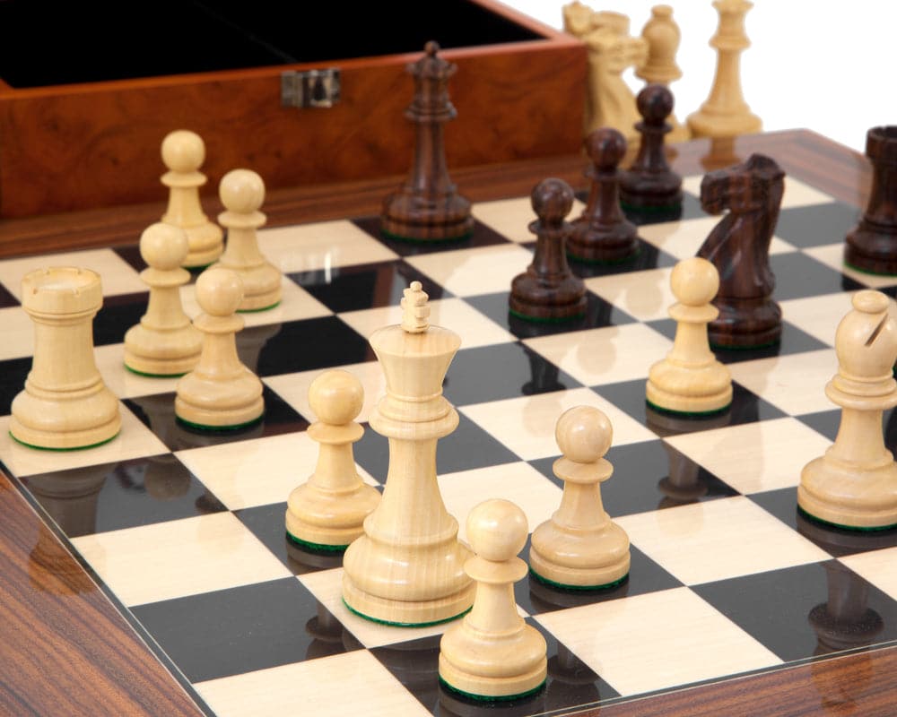 Supreme Rosewood chess set with Staunton design pieces and burl wood case on an 18-inch checkered board.