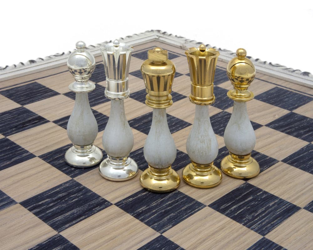 The San Severeo Chess Set on a wooden chessboard with gold and silver Florence-crafted pieces.