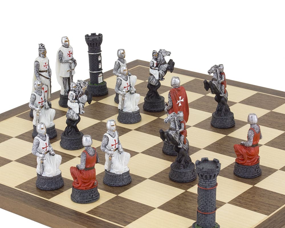 The Crusader Hand Painted Chess Set by Italfama featuring intricately detailed knight and bishop pieces on a chessboard.