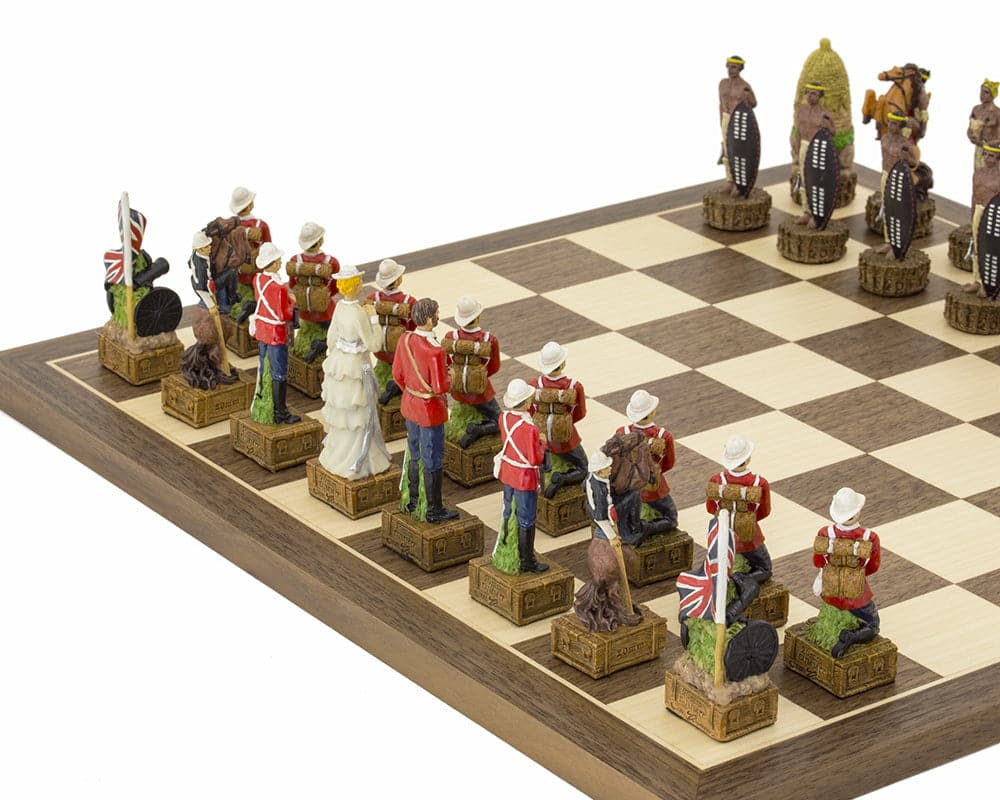 Hand-painted British Vs Zulu themed chess set by Italfama on walnut and maple board, featuring detailed chess pieces.