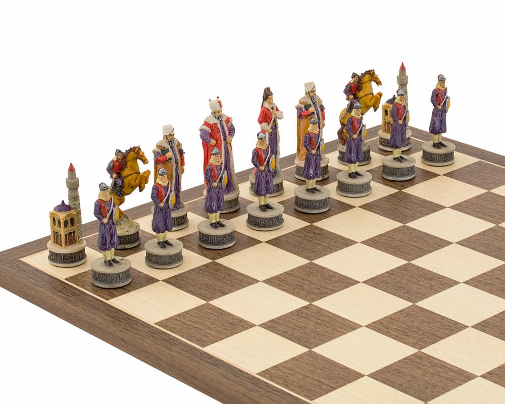 Hand-painted Hungarian vs Turkish themed chess set by Italfama on a wooden chessboard.