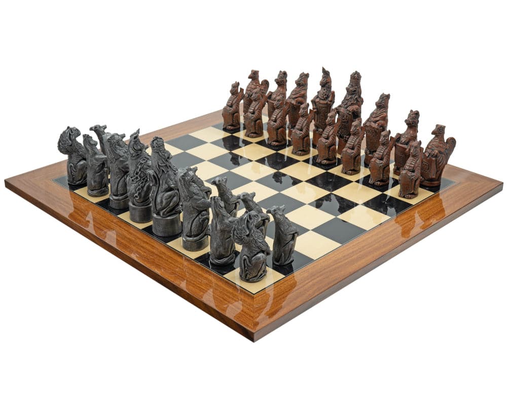 The Berkeley Chess Royal Beasts Metal and Palisander Grand Chess Set on a polished wooden chessboard