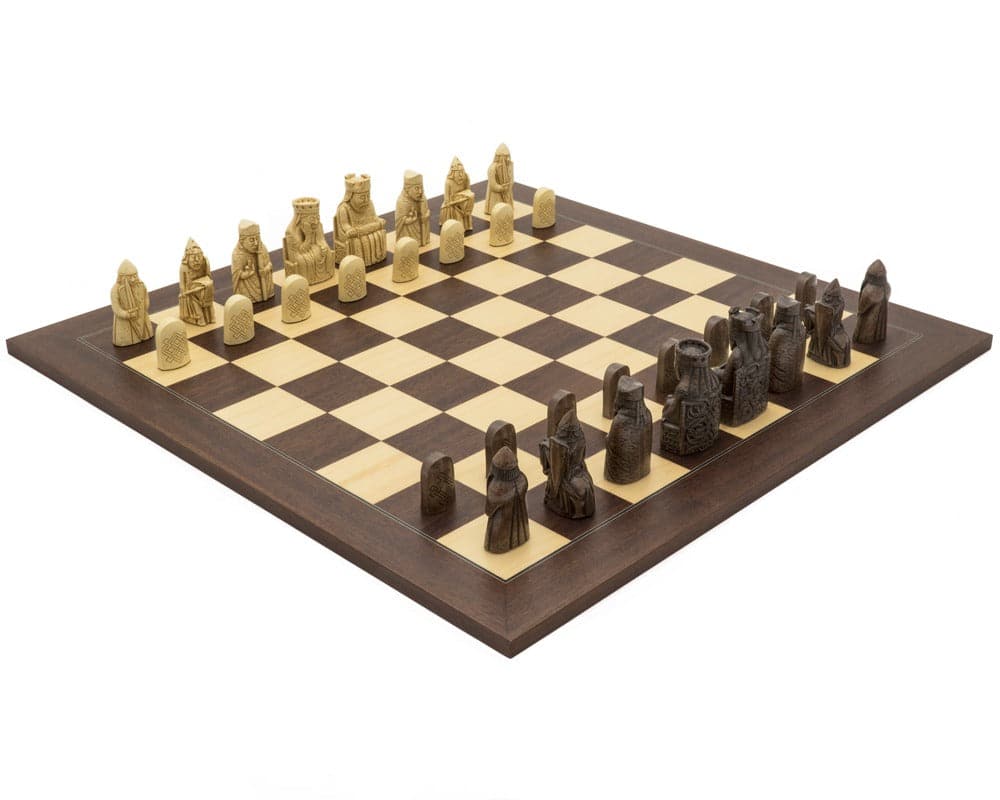 The Isle of Lewis Montgoy Palisander Grand Chess Set with intricately carved chess pieces on a beautiful wooden chess board.