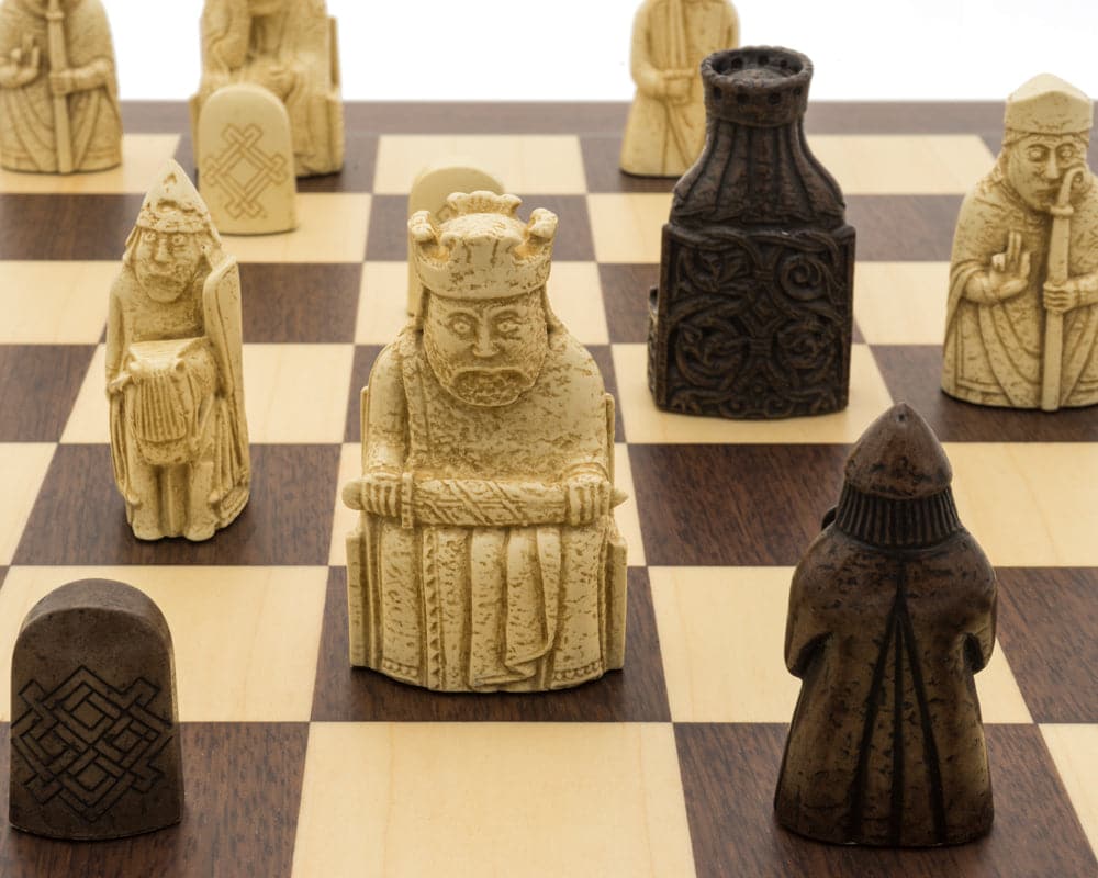 Isle of Lewis Montgoy Palisander Grand Chess Set pieces on a beautifully crafted chess board with detailed, historic designs