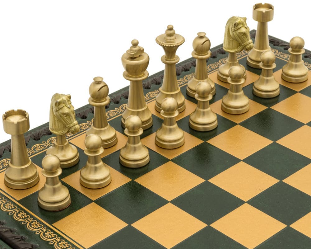 Luxurious Turin Verde Italian chess set with handcrafted ebony chess men on a detailed black and golden board.