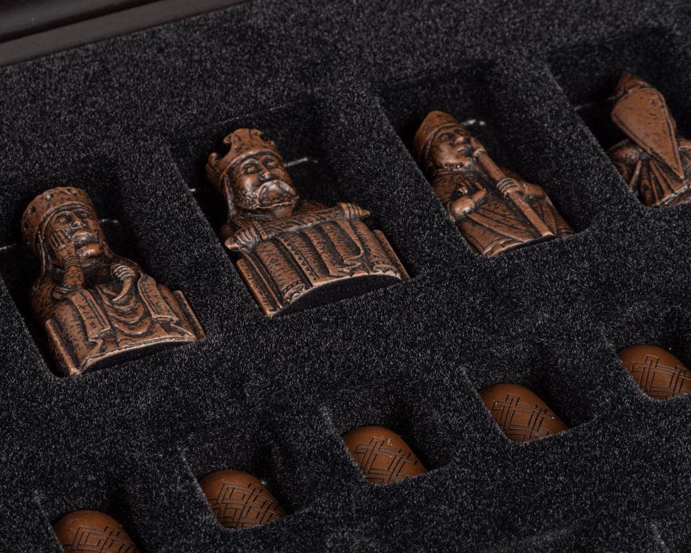 Isle of Lewis deluxe chess pieces with walnut presentation box showcasing detailed craftsmanship and high quality design.