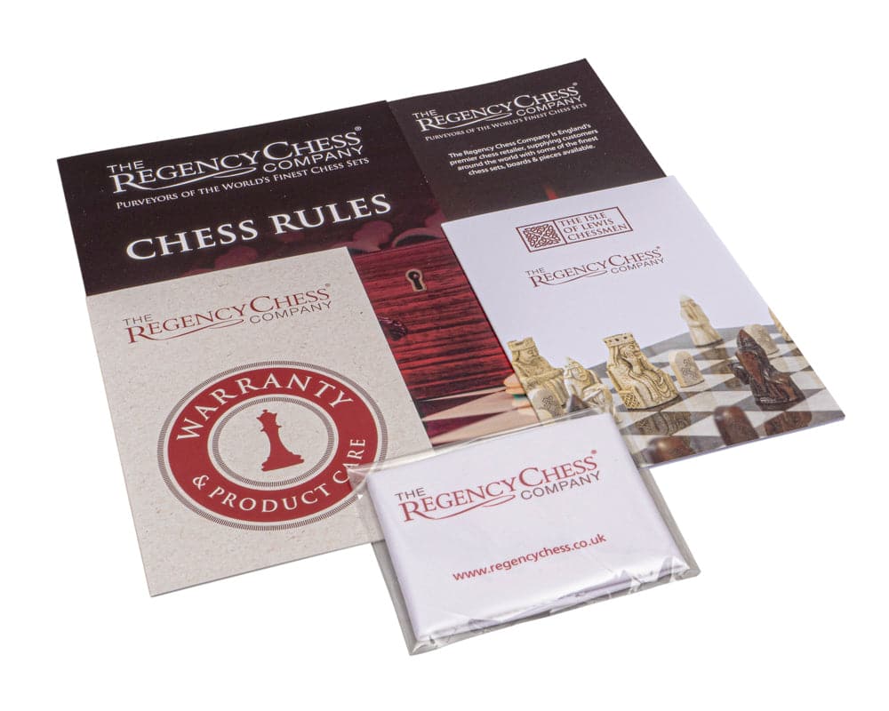 Regency Chess Company packaging including chess rules, warranty, and product care information on a white background