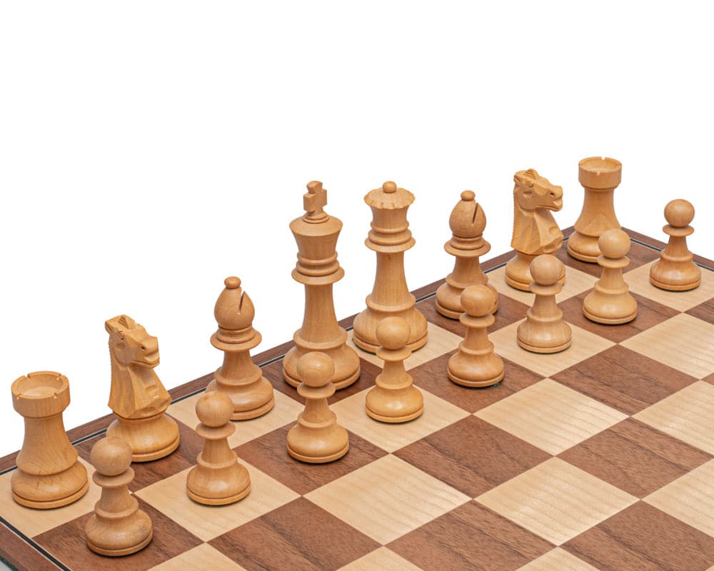 Walnut and black wooden chess pieces set up on a chessboard.