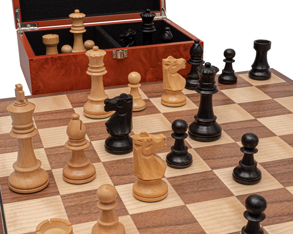 The Conquest Walnut and Black Folding Chess Set with Staunton Chessmen on walnut and maple board, crafted in Spain.