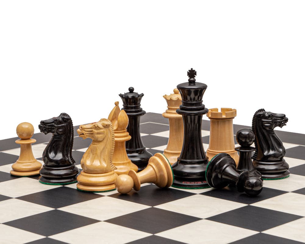 The 1849 Original Staunton Ebony and Black Grand Chess Set on 23.6 inch board with 4.4 inch king and 1.97 inch bases.