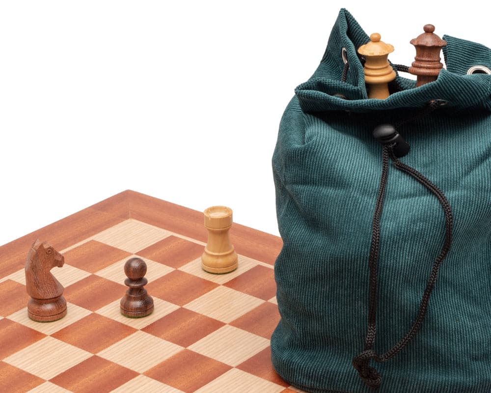 Down Head Sheesham and Mahogany Chess Set with Green Storage Bag on Wooden Chessboard