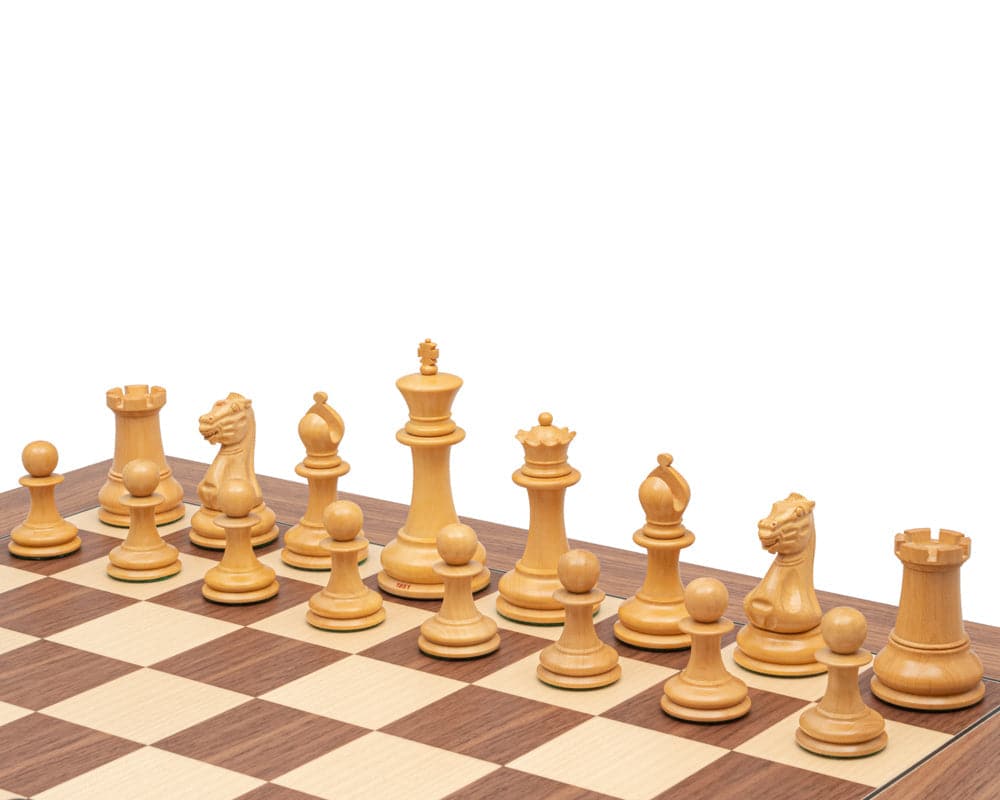 Luxury Staunton chess set featuring a finely crafted yellow wood finish on a checkerboard.